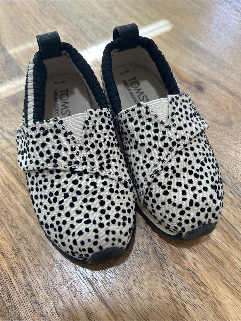 TOMS Kids Slip-Ons in Cream with Black Spots